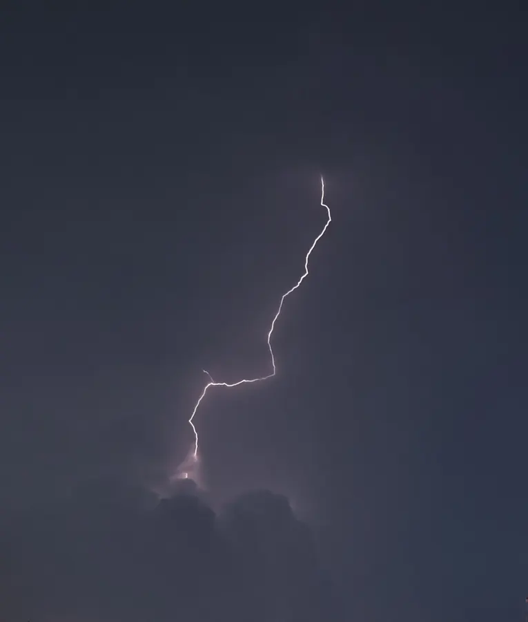 A lightning strike during a night storm